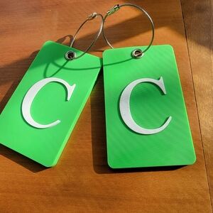Green "C" Luggage Tags